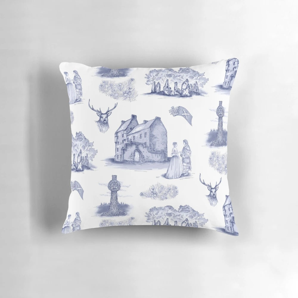 Decorative blue and white toile pillow with a highlander and Scottish inspired design