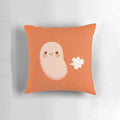 Orange and white baked beans farting pillow with a playful, silly design.