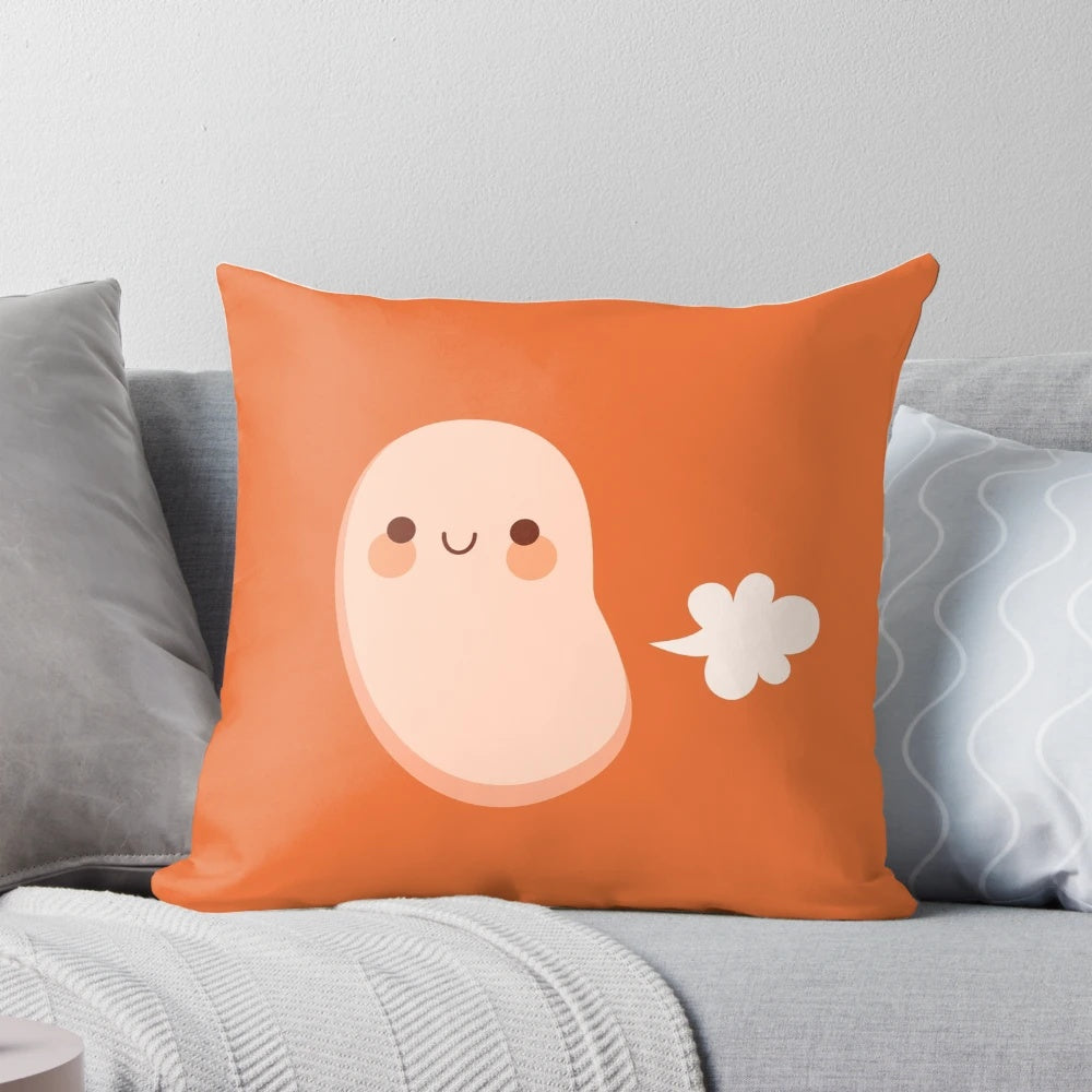Orange and white baked beans farting pillow with a playful, silly design.