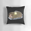 Decorative pillow featuring a meme of a sad, crying cat with a baked potato