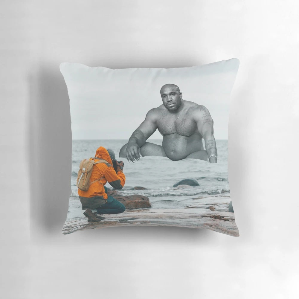 Image of a pillow with the silhouette of a naked black man, inspired by the Barry Wood meme