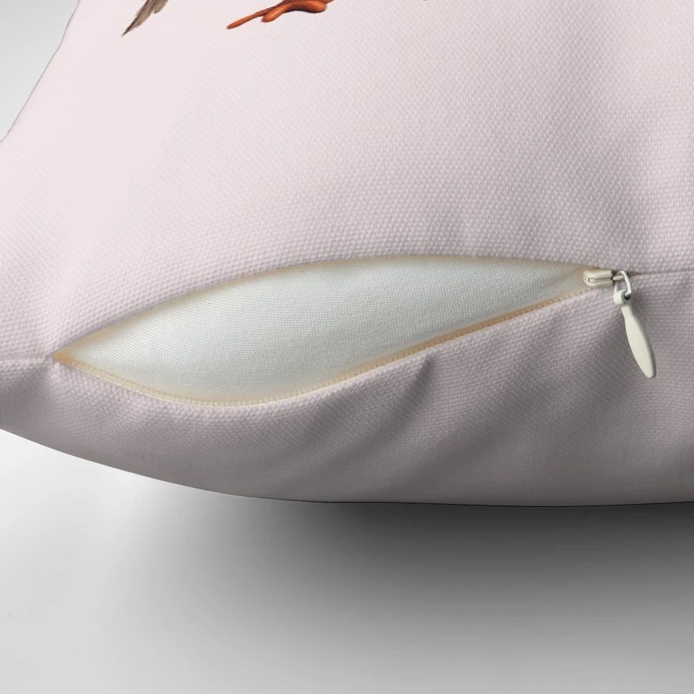 Colorful graphic design of a playful, cartoon-style bird on a decorative pillow