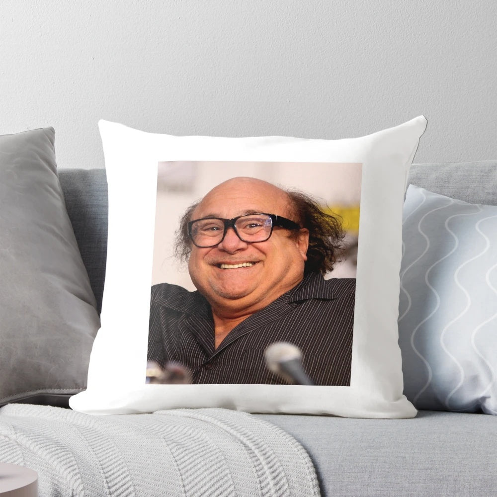 Danny DeVito meme printed on a soft, plush pillow for a touch of dark humor in your home decor.