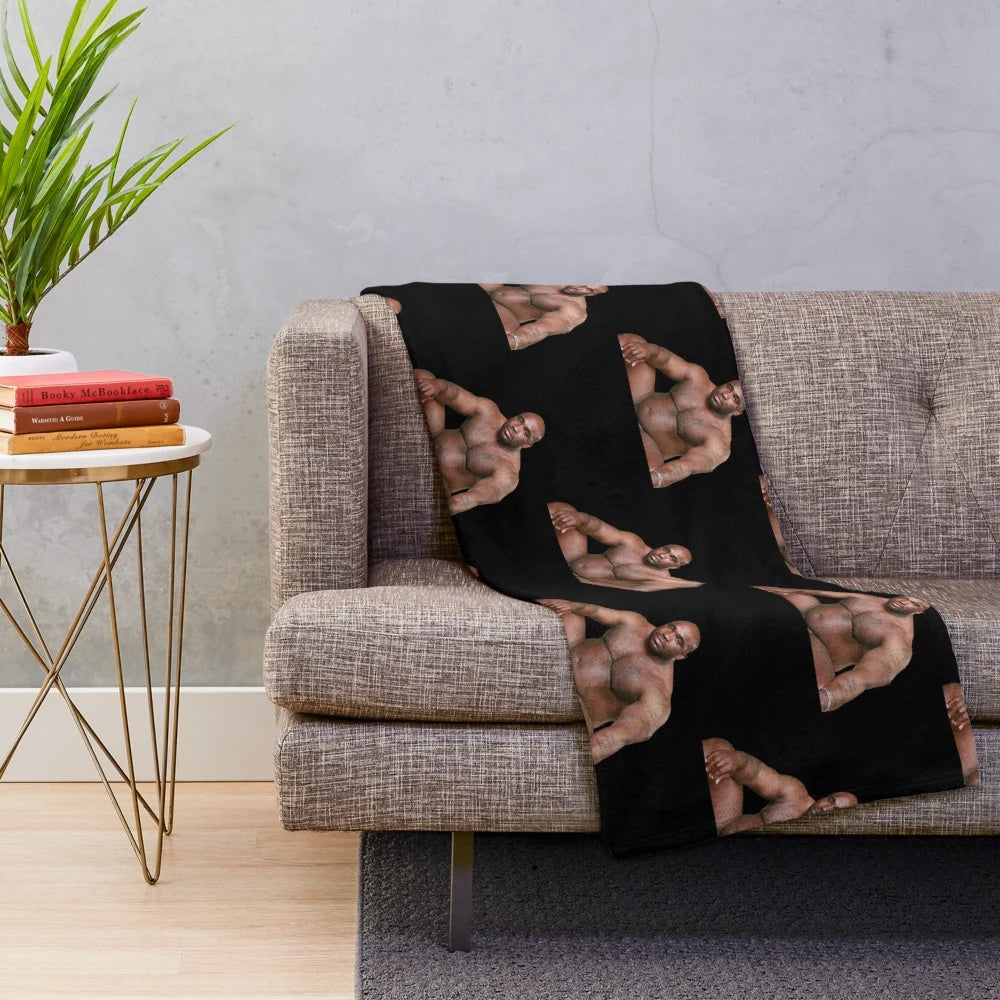 Funny meme plush blanket featuring a large black man sitting on a bed