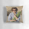 Photograph of a Pillow featuring Michael Cera holding a Cactus in the Desert
