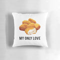 A white, square pillow with the text "chicken nuggets my only love" printed on it.