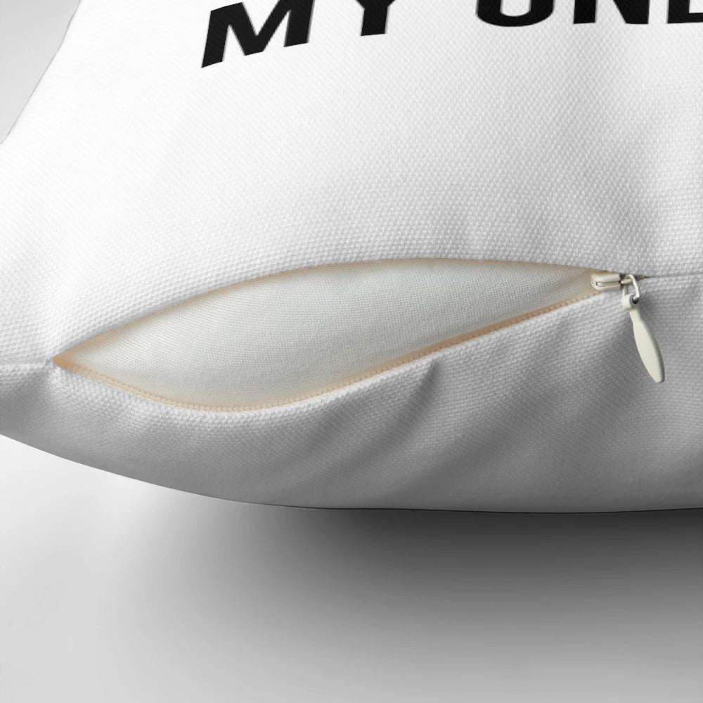 A white, square pillow with the text "chicken nuggets my only love" printed on it.