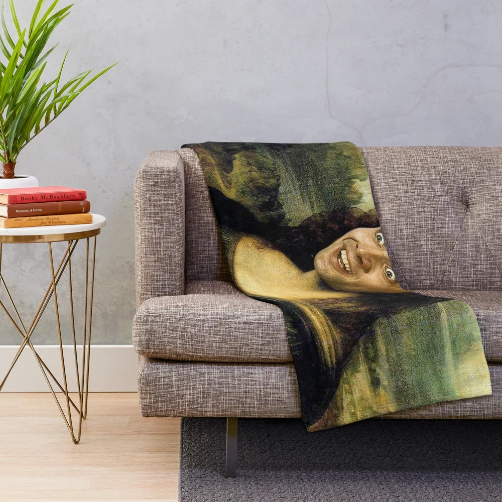 Nicolas Cage's face edited onto the Mona Lisa on a plush blanket