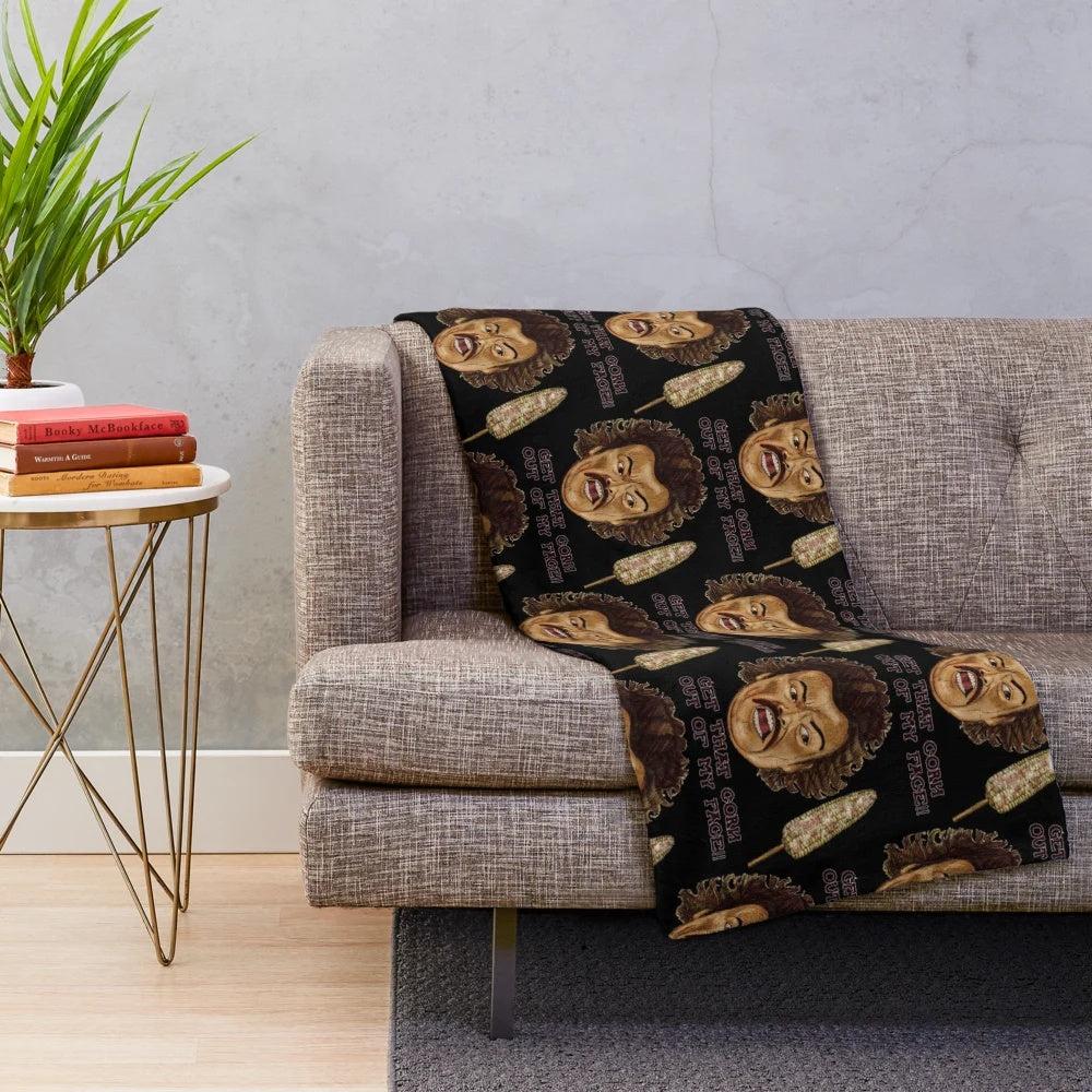 Plush blanket with corn and wrestling graphics