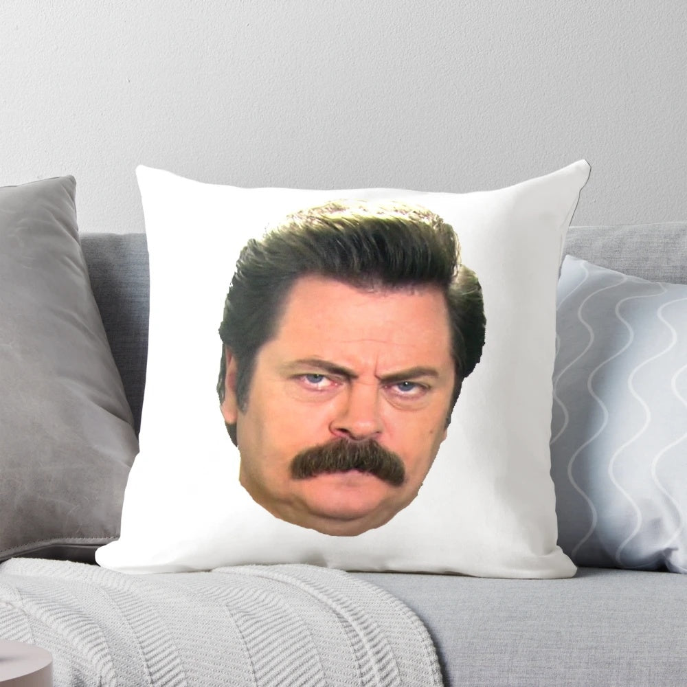 A funny and whimsical pillow featuring the iconic face of Ron Swanson from the TV show Parks and Recreation.