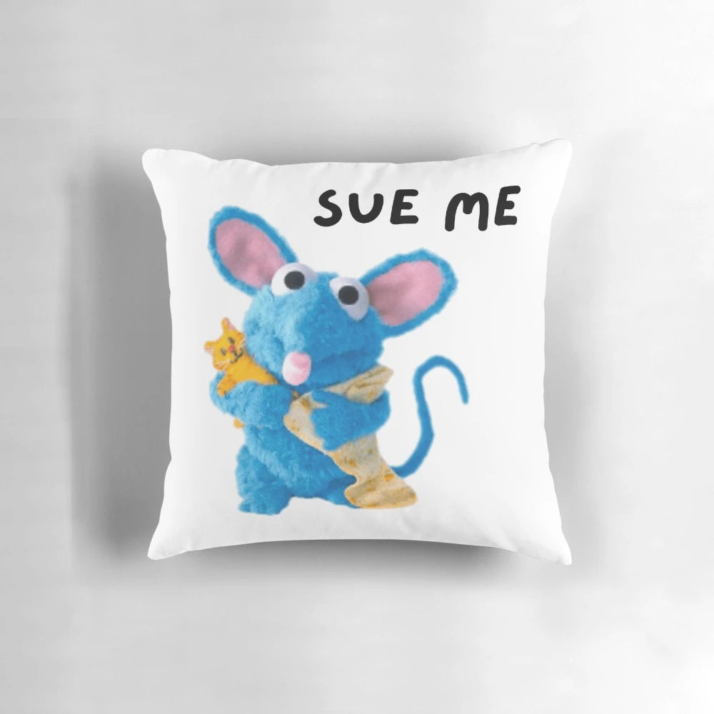Sue Me" throw pillow with a playful, meme-inspired design