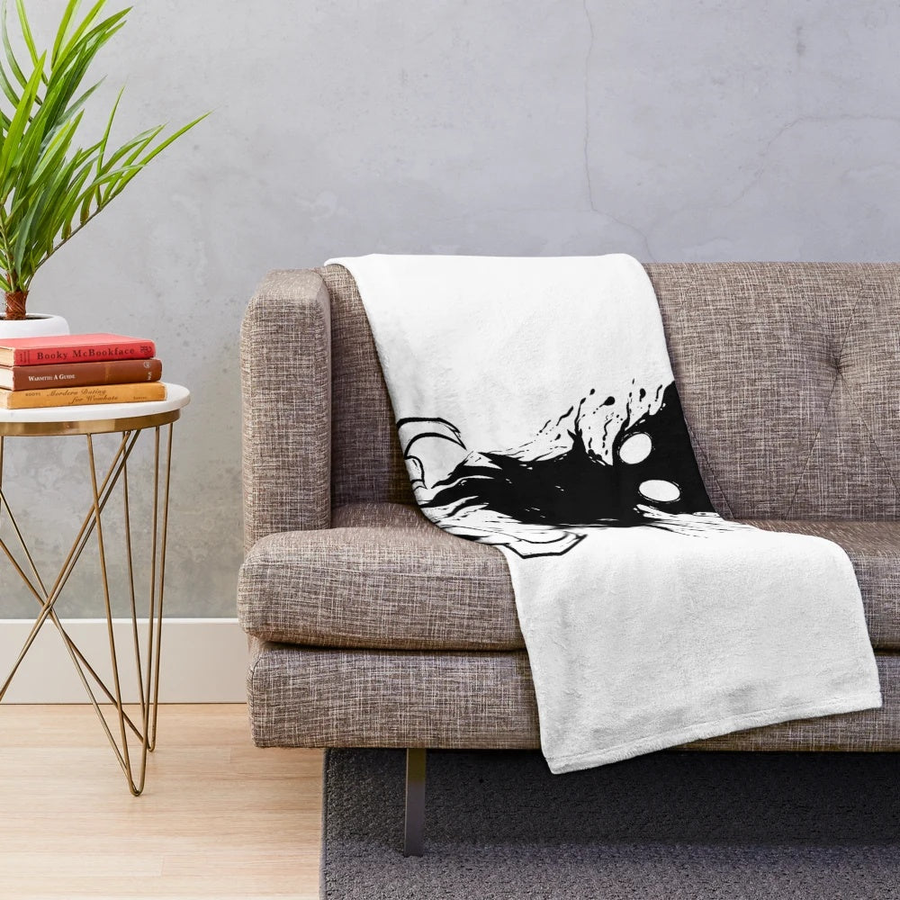 Hollow Knight-inspired plush blanket featuring the game's iconic hollow void design