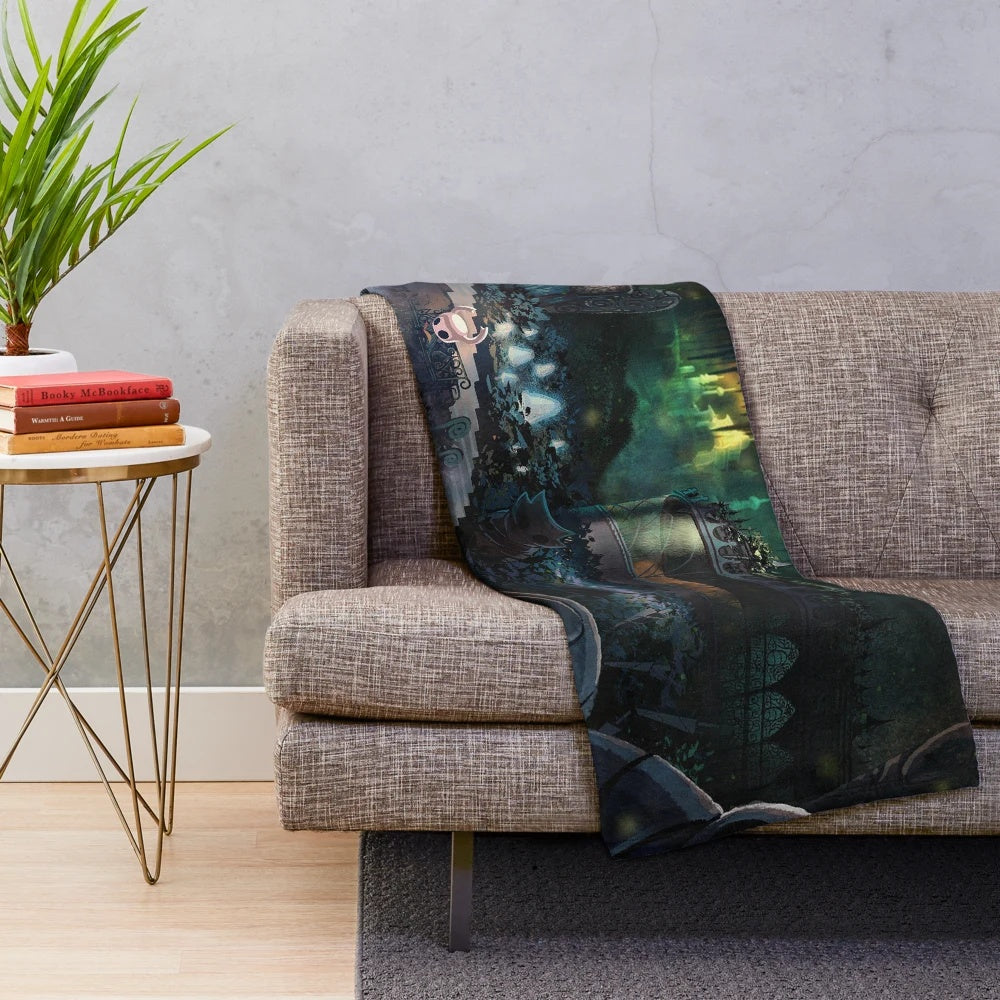 Hollow Knight inspired plush blanket featuring the game's iconic characters and symbols