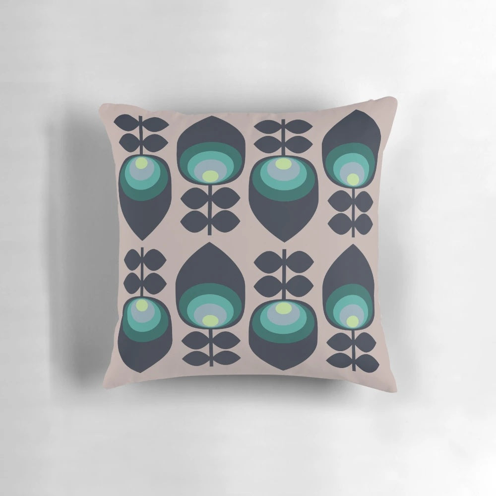 Hoodwinked floral-patterned pillow in teal, aqua, and lime-green colors
