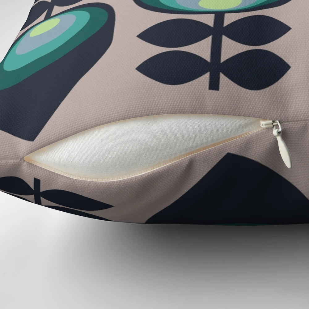 Hoodwinked floral-patterned pillow in teal, aqua, and lime-green colors