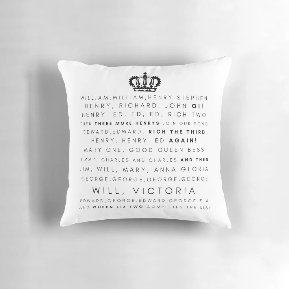 Decorative pillow featuring illustrations of historic British kings and queens from the Horrible Histories series