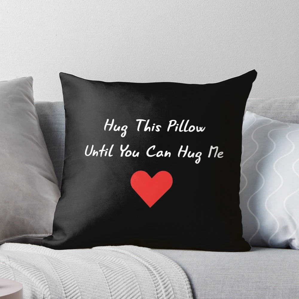 Plush hug pillow for long distance relationships, featuring the text "Hug This Pillow Until You Can Hug Me"