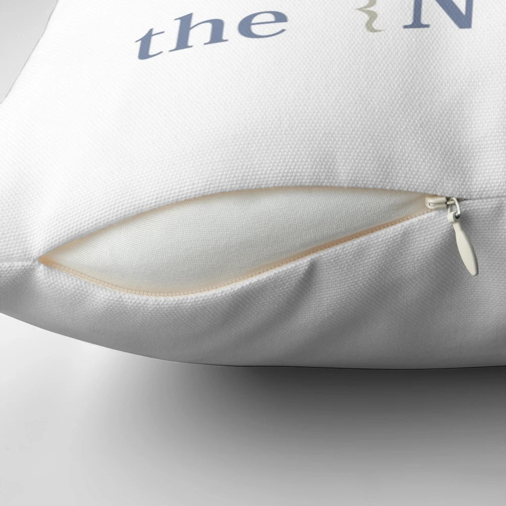 Soft, white throw pillow with the text 'I Love You a Bushel and a Peck & a Hug Around the Neck' printed on it.