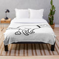 Plush blanket featuring a comedic dog pooping design