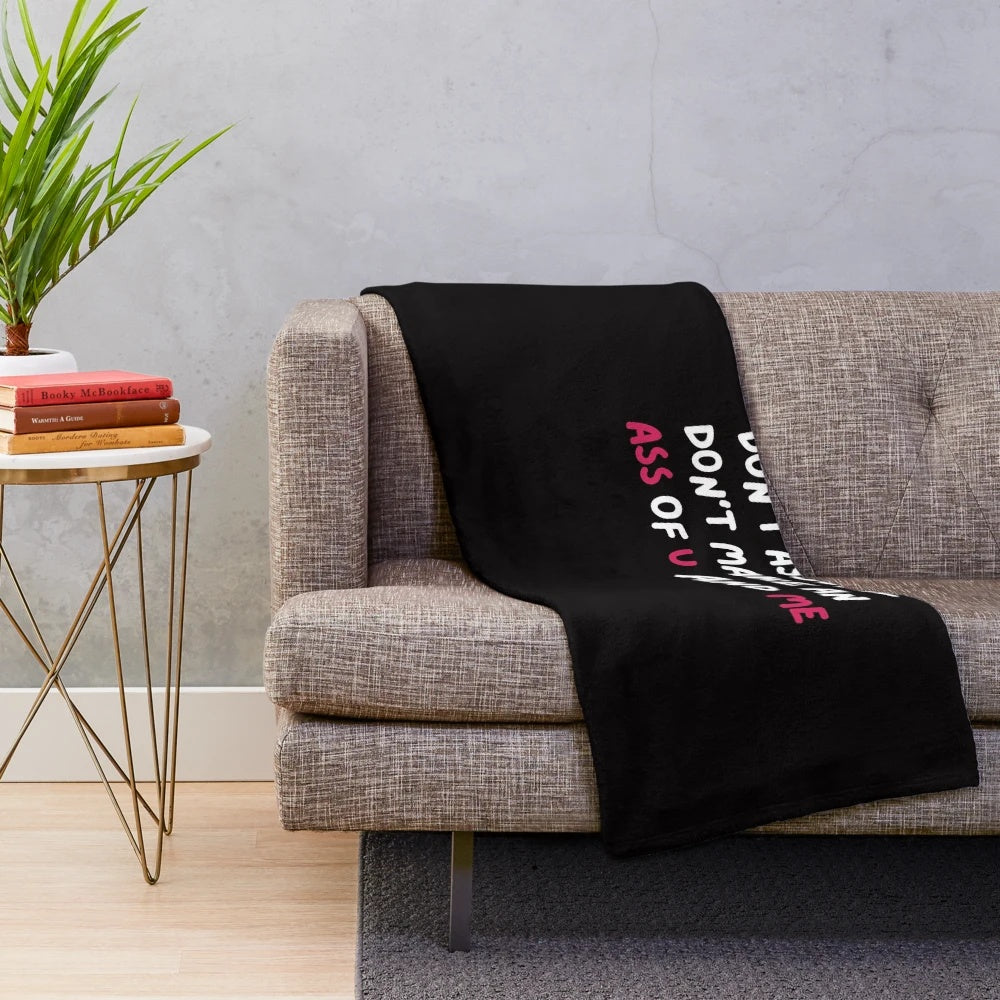 Don't Assume" plush blanket with a humorous message for accountants and finance professionals