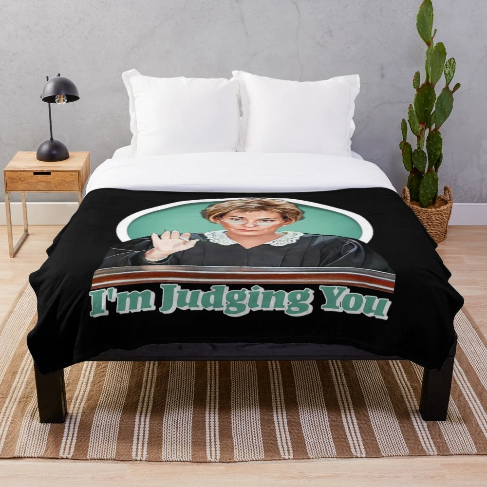 A plush blanket featuring the iconic Judge Judy