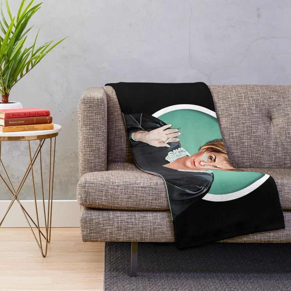 A plush blanket featuring the iconic Judge Judy