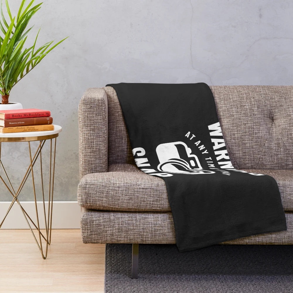 Photographer-themed plush blanket with "At Any Time I May Snap" design