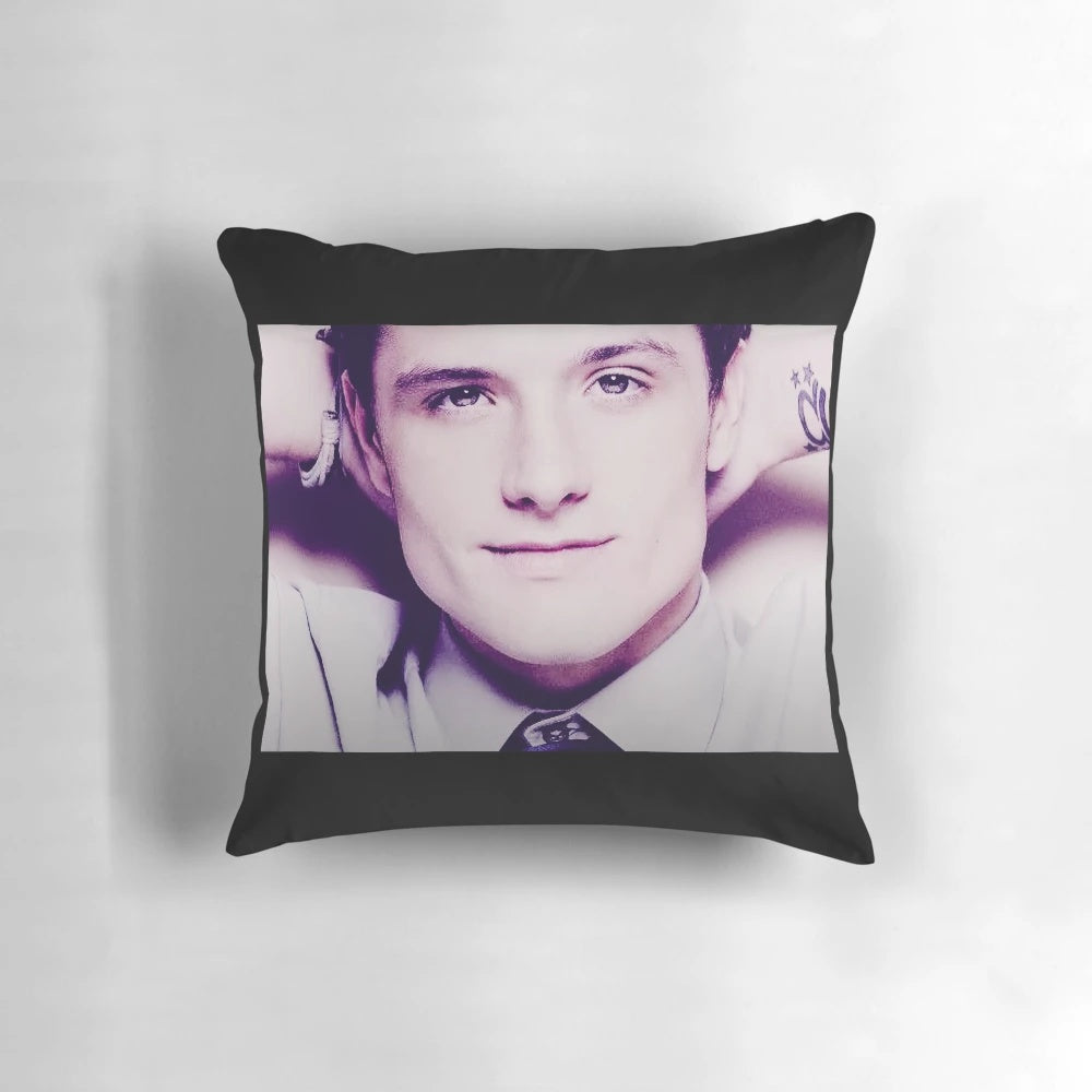 A pillow featuring a meme image of actor Josh Hutcherson with the text "Can You Blow My Whistle Baby".