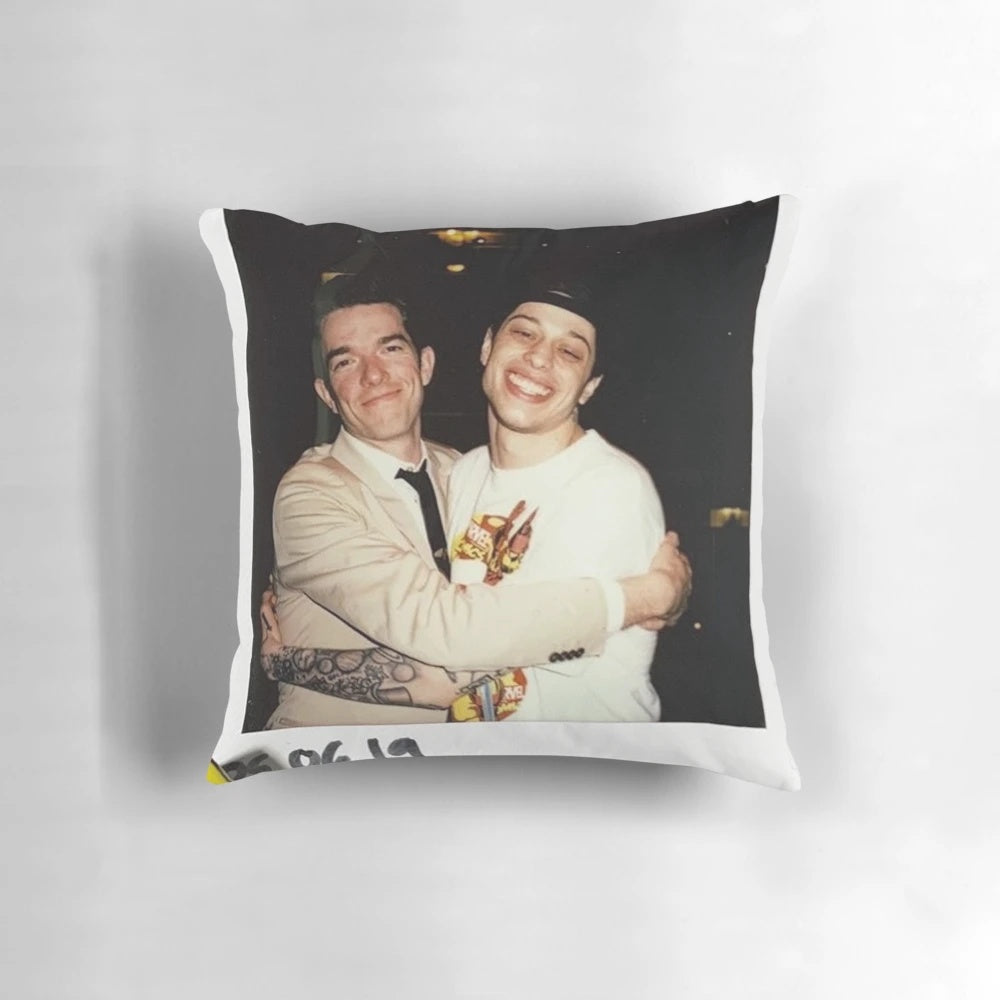 Pillow featuring caricatures of comedians Pete Davidson and John Mulaney