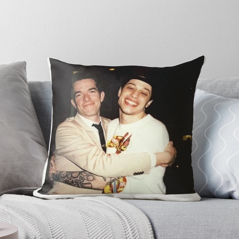 Pillow featuring caricatures of comedians Pete Davidson and John Mulaney