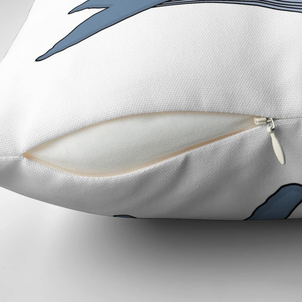 A decorative throw pillow featuring a whimsical illustration of a humpback whale with the text "Oh Whale" in a stylized calligraphy-inspired font.