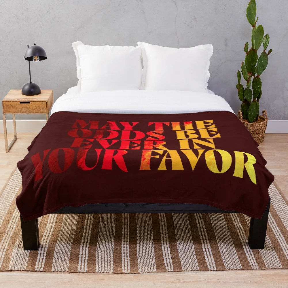 Hunger games inspired plush blanket with mockingjay symbol and district 12 design