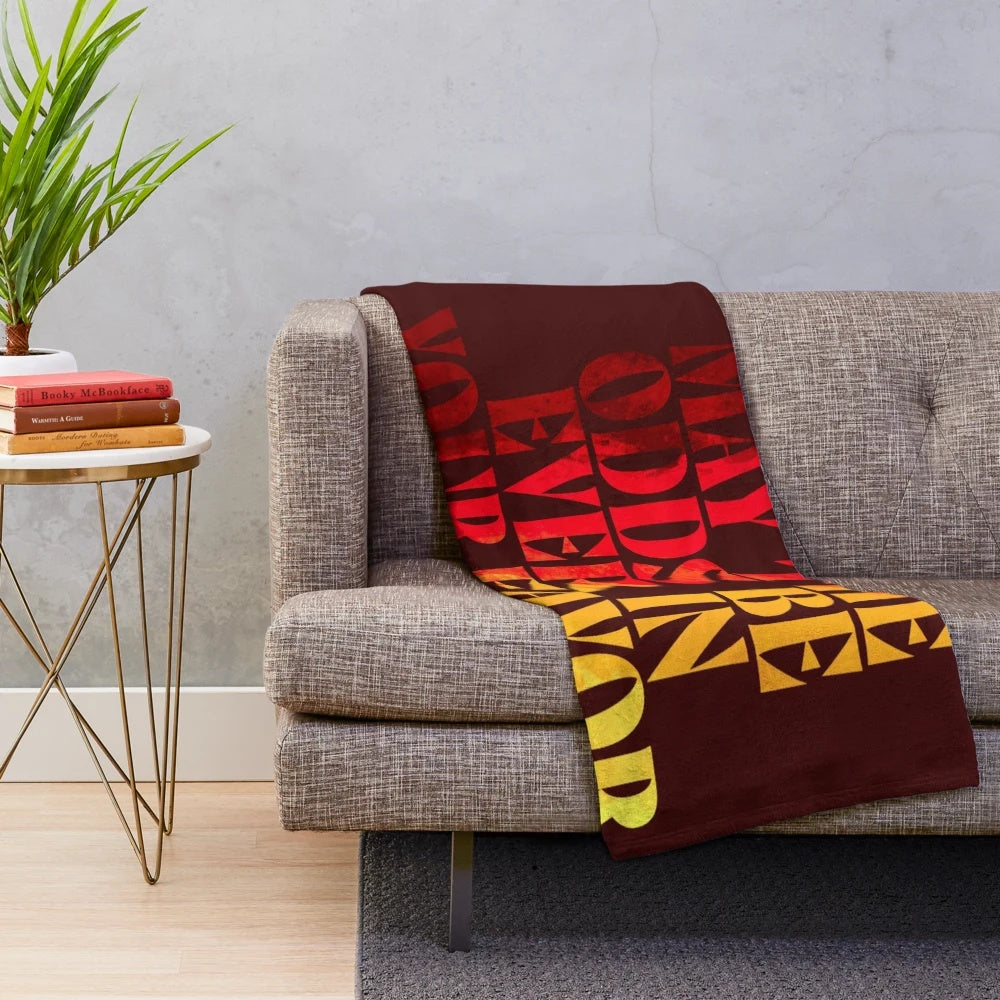 Hunger games inspired plush blanket with mockingjay symbol and district 12 design