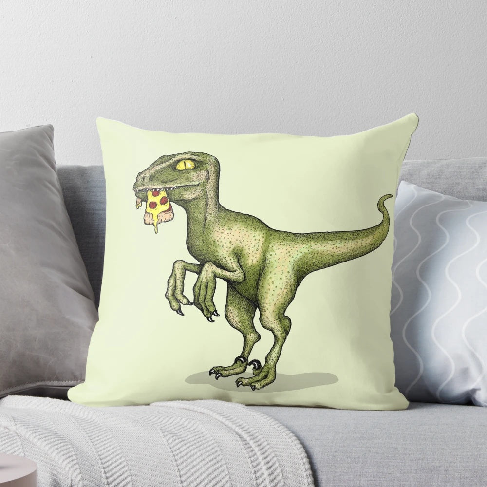A green raptor dinosaur aggressively eating a slice of pizza on a cozy throw pillow.