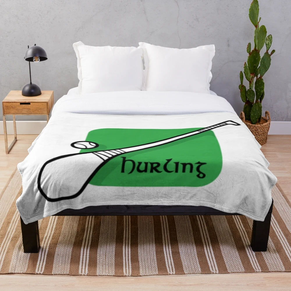 Hurling plush blanket with hurling-inspired design