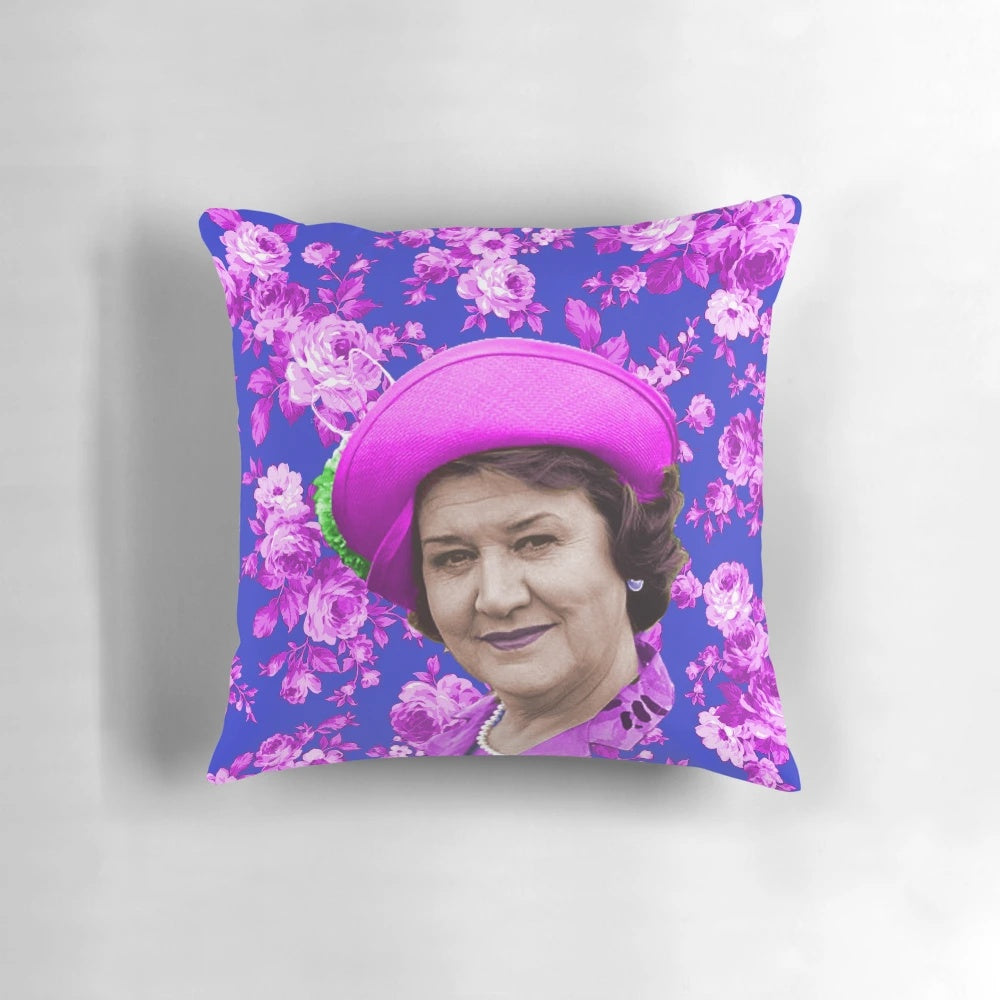A humorous Keeping Up Appearances-themed pillow featuring the iconic Hyacinth Bucket character.