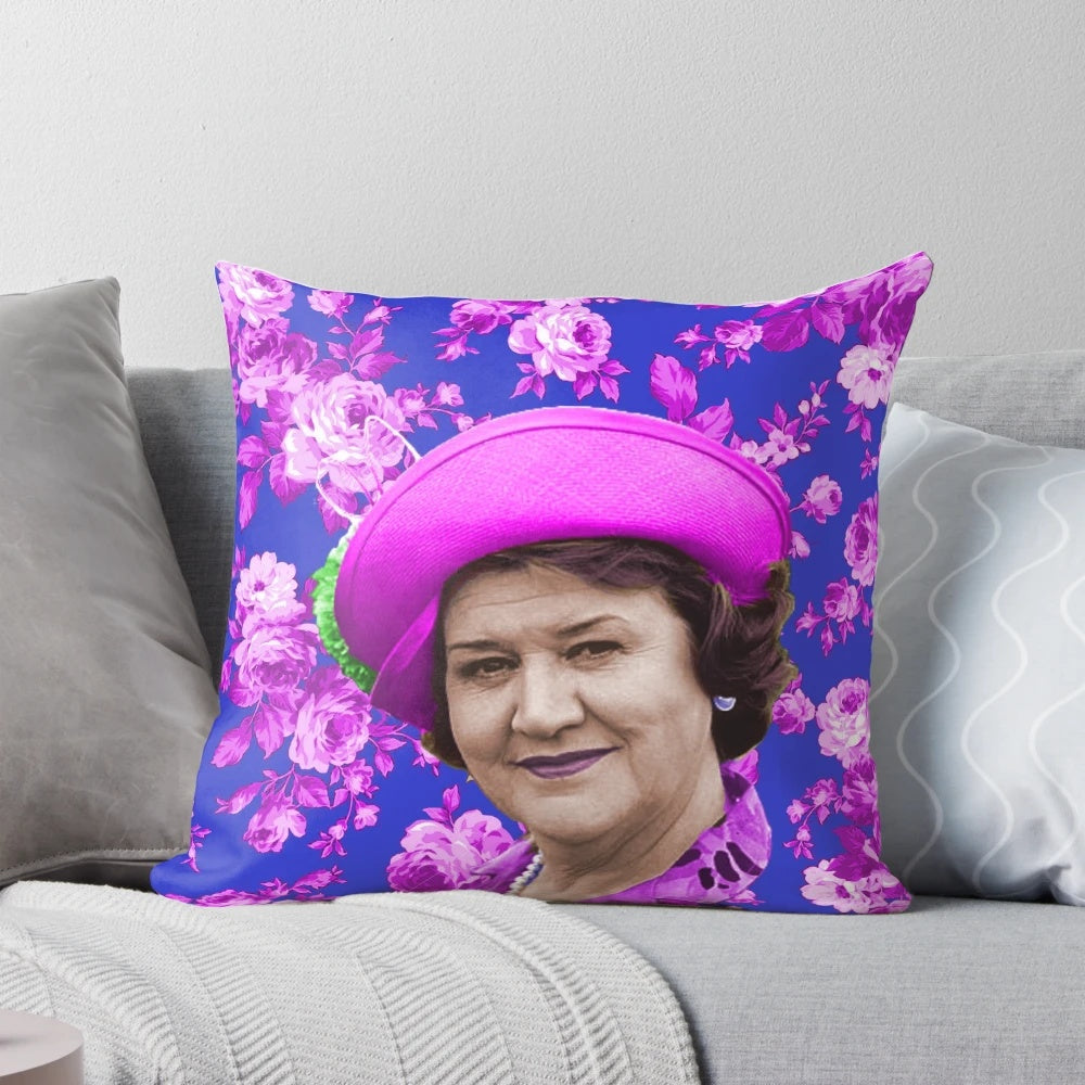 A humorous Keeping Up Appearances-themed pillow featuring the iconic Hyacinth Bucket character.