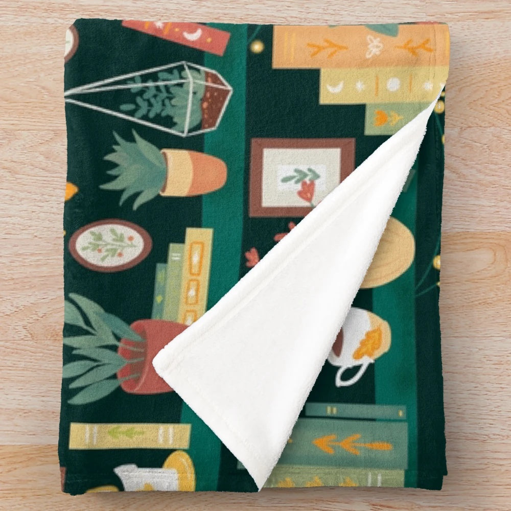 Soft and plush blanket with a cozy, library-inspired design
