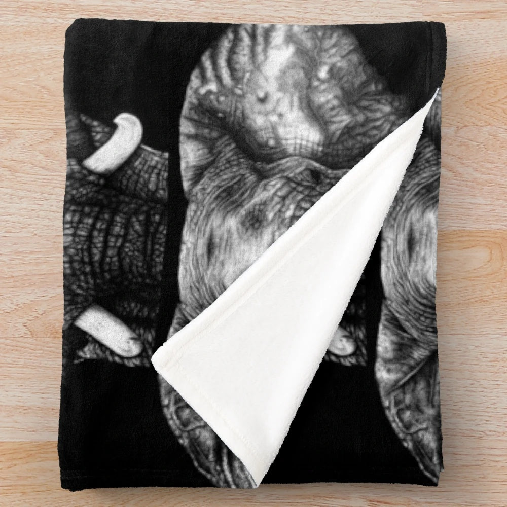 Hyper-realistic biro elephant portrait printed on a plush blanket