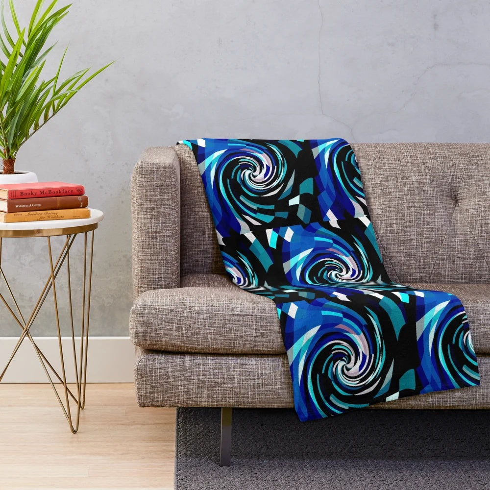 Hypnotic blue and white geometric patterned plush blanket
