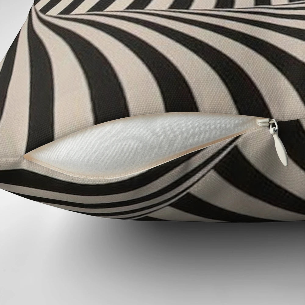 A visually striking psychedelic art pillow featuring a mesmerizing spiral design in black and white.