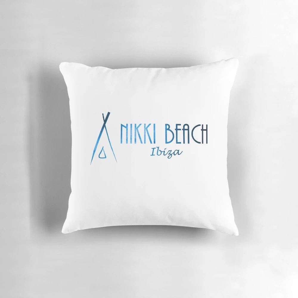 Vibrant blue pillow with Ibiza beach club and party design