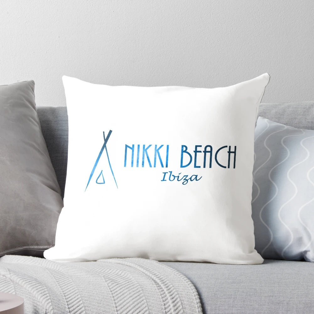 Vibrant blue pillow with Ibiza beach club and party design