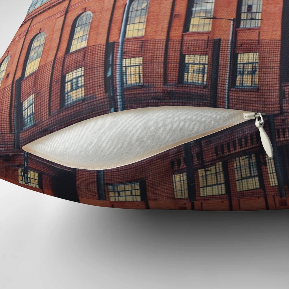 Pillow featuring a photograph of Ibrox Stadium in Glasgow, Scotland at blue hour.