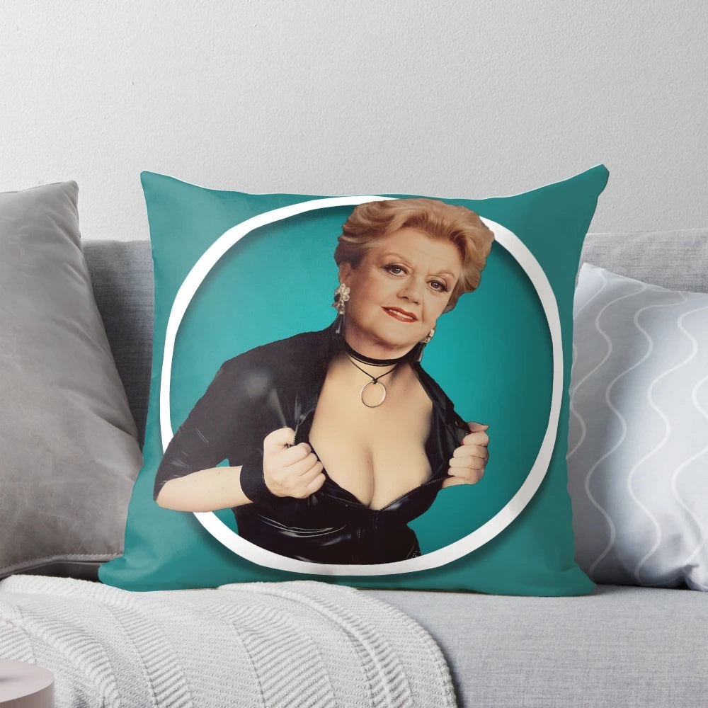 Colorful and whimsical pillow featuring the iconic character Jessica Fletcher from the 1980s TV show "Murder, She Wrote" played by Angela Lansbury.