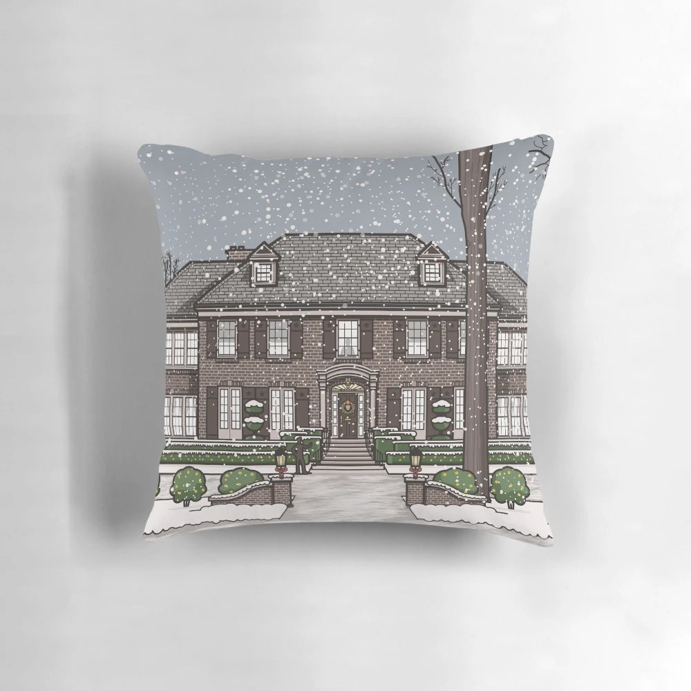A cozy Christmas pillow featuring the home from the classic 1990 film "Home Alone"
