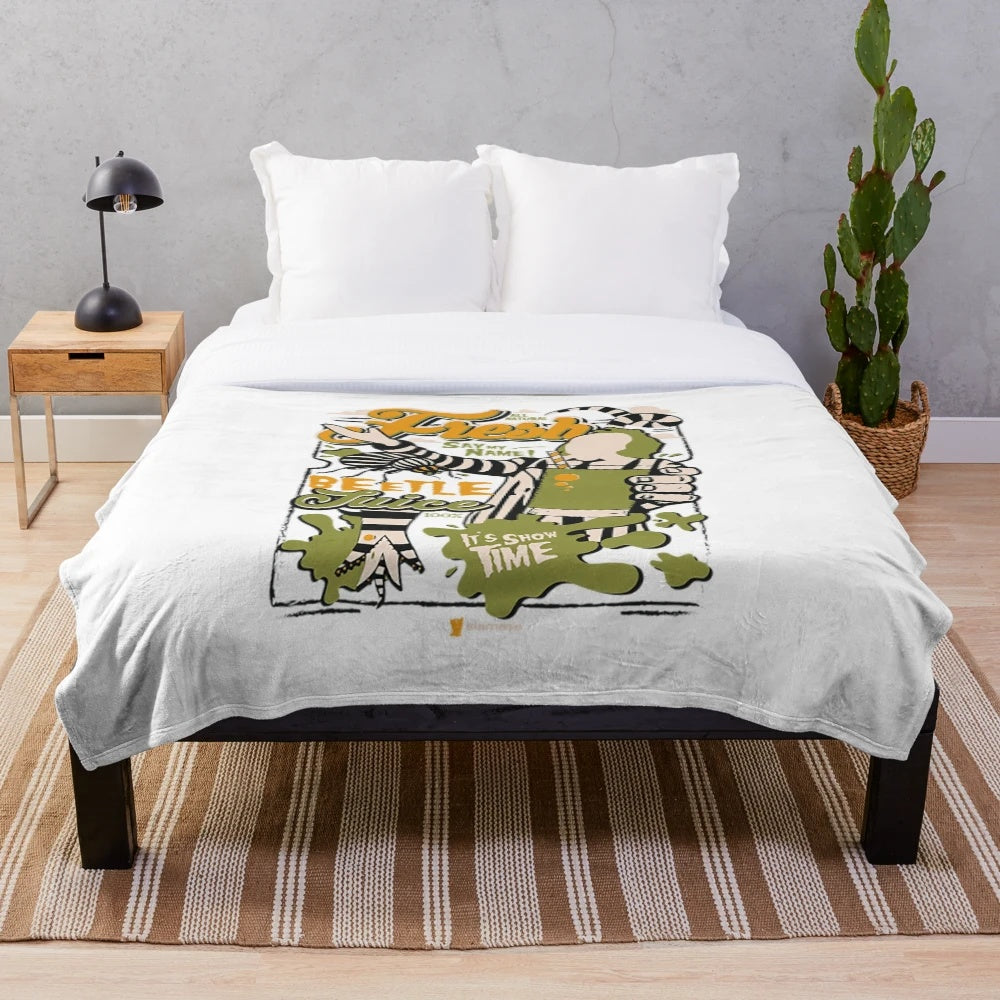 Beetlejuice inspired plush blanket with the iconic character design