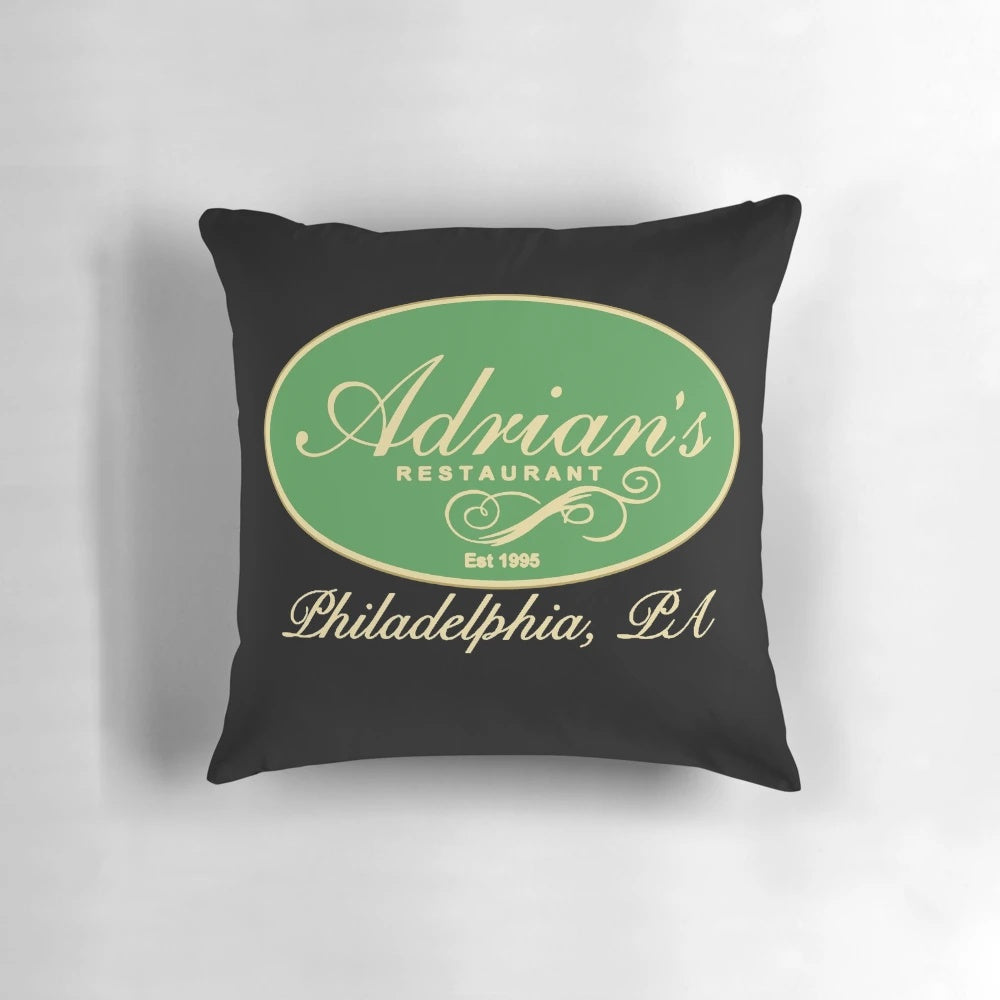 An image of the Adrian's Restaurant Pillow, featuring a depiction of the iconic restaurant from the Rocky movies.