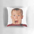 A decorative pillow featuring the iconic "Ahh!" scream of Kevin McCallister from the Home Alone movie.