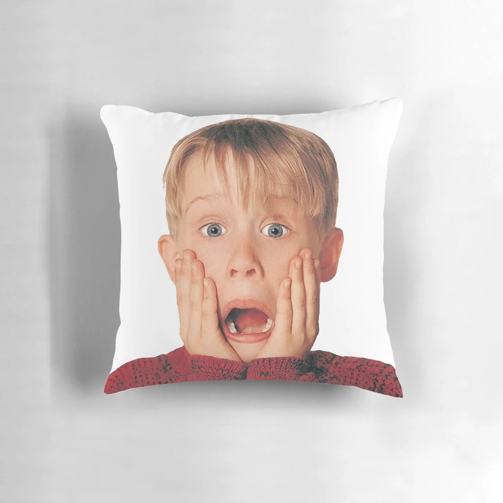 A decorative pillow featuring the iconic "Ahh!" scream of Kevin McCallister from the Home Alone movie.